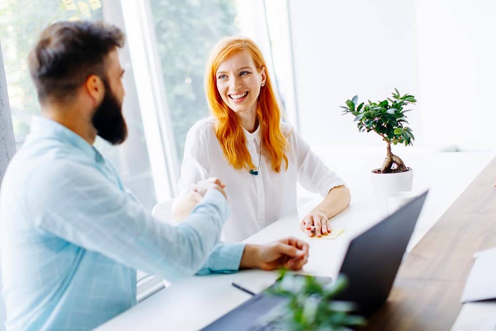 visual data cloud consultant shaking a clients hand