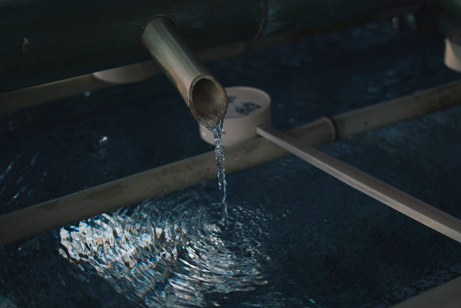 water flowing out of a pipe