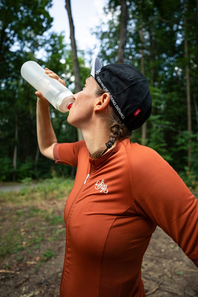 Markus Spiske Woman Drinking Water In Mountains Unsplash